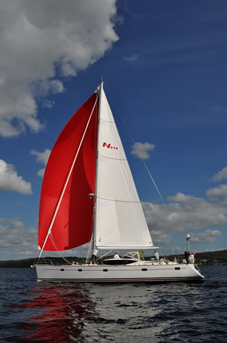 asymmetric spinnaker with snuffer on a broad reach off Sweden